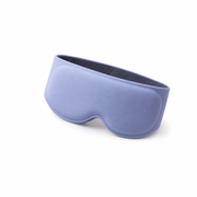 The Eclipse contoured weighted sleep mask in Periwinkle, three-quarter studio view