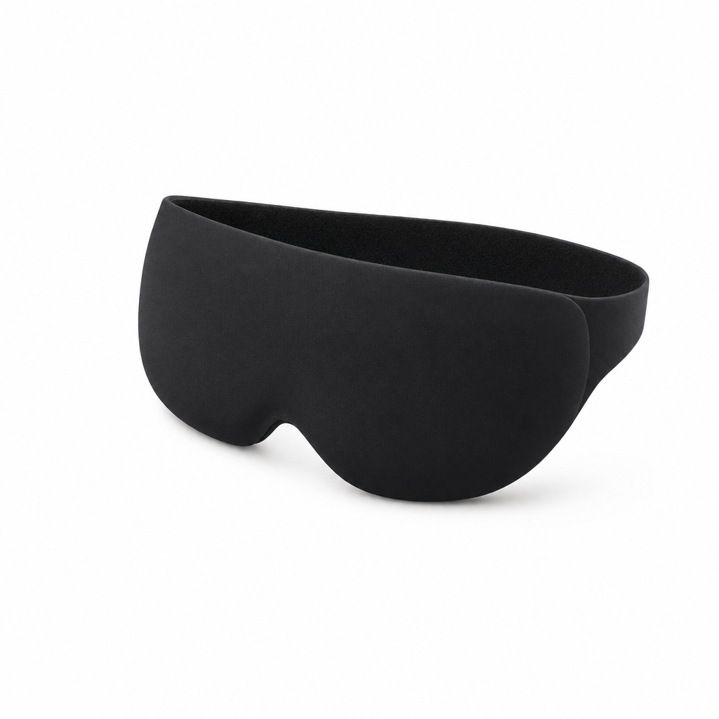The Eclipse contoured weighted sleep mask in Midnight Black, three-quarter studio view