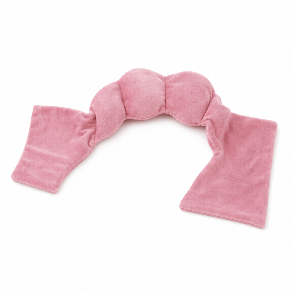 The Lull weighted eye pillow in Blush Rose, showing the segmented pods and tie tails