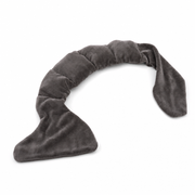 The Lull weighted eye pillow in Charcoal, showing the segmented pods and tie tails